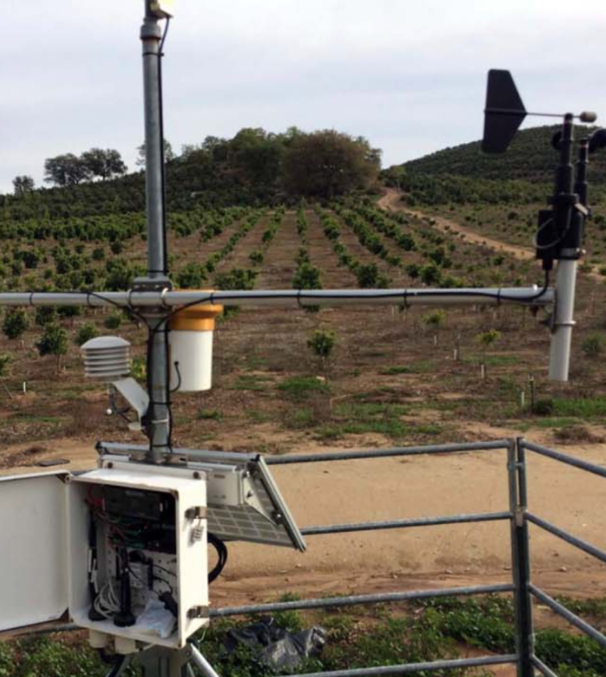 Environmental monitoring station in a field